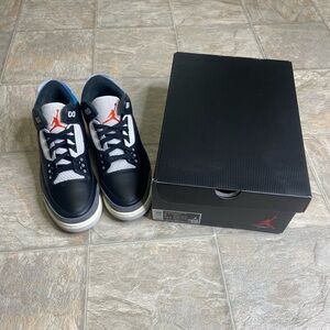 Jordan Black and White High-Top Sneakers